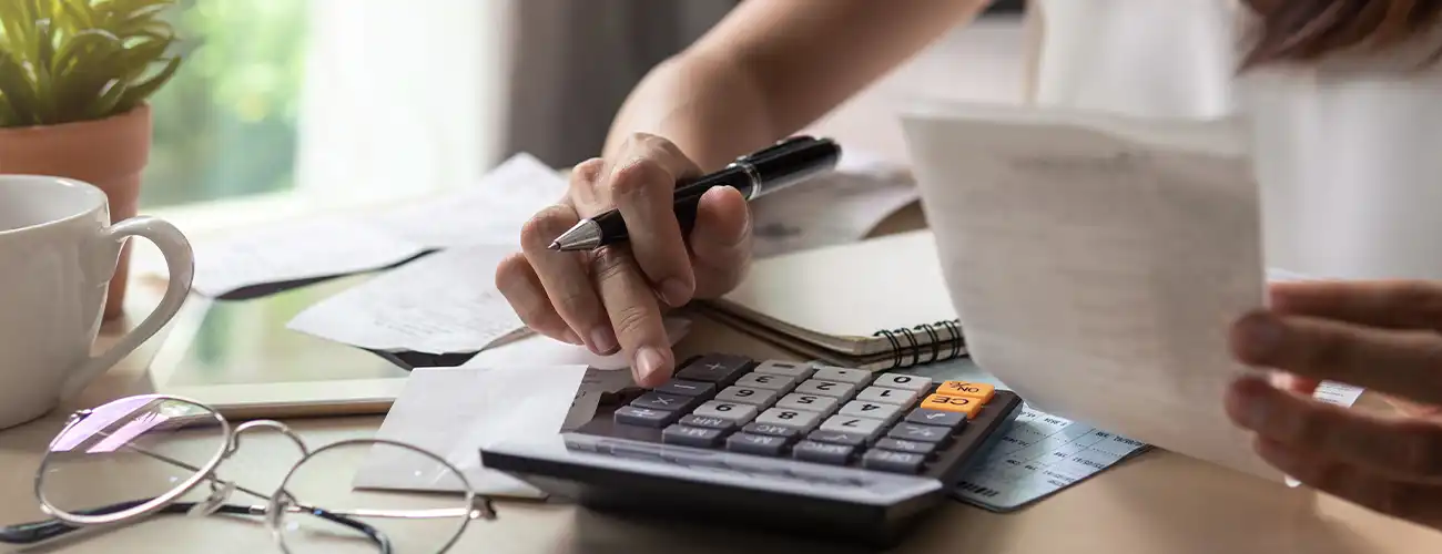 person using calculator